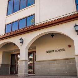 Photo of the front of Partridge Hall, home of the School of Nursing.